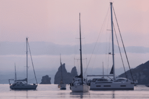 Porquerolles island turquoise water and sailboats, Golden Islands of Hyères